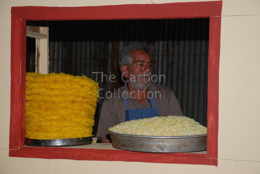 DSC 0028 
 Fresh snacks outlet at the Annual Exhibition (Numaish) in Hyderabad, India. 
 Keywords: snacks food hyderabad india