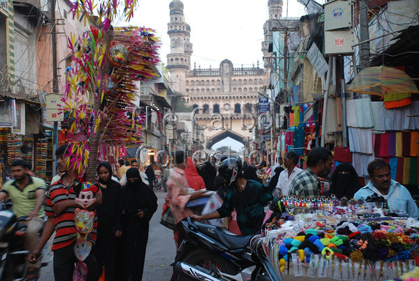 DSC 0172 
 Looking down the Lad Bazar street market towards Charminar in Hyderabad, India. 
 Keywords: india street market trader shopping charminar