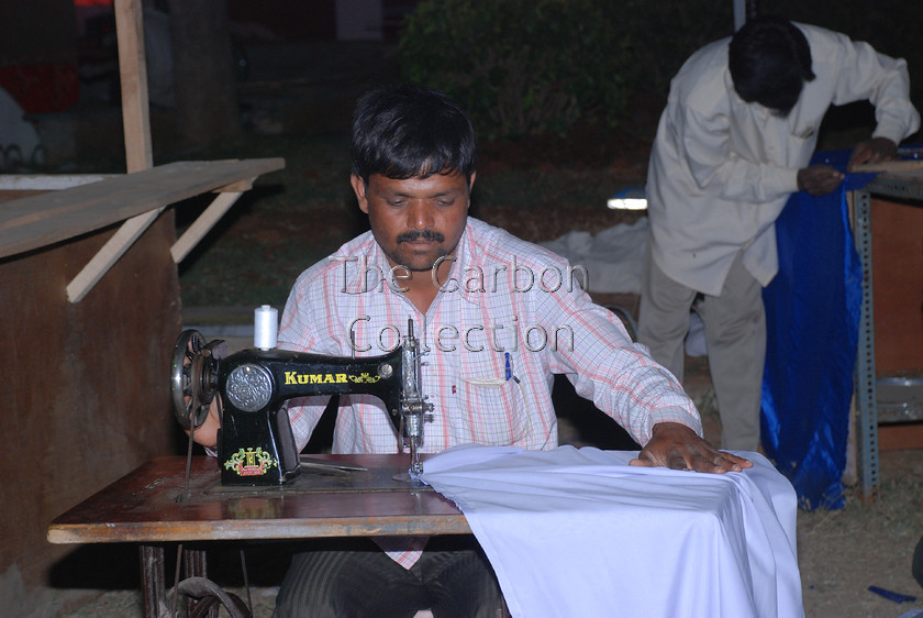 DSC 0031 
 Made-to-order items at the Annual Exhibition (Numaish) in Hyderabad, India. 
 Keywords: sewing machine india tailor